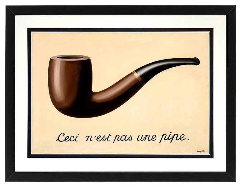 The Treachery of Images by René Magritte Framed Print